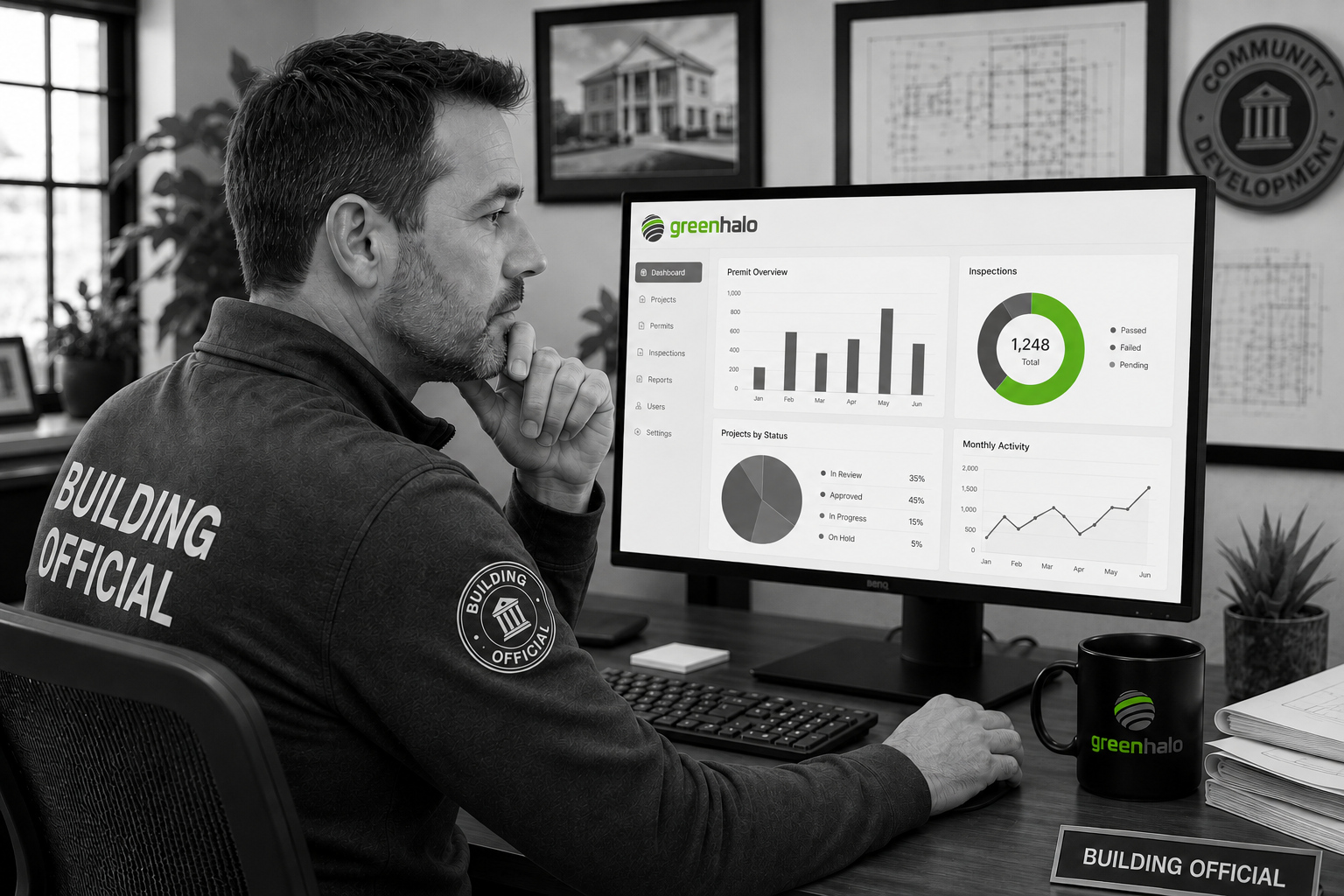 Building official reviewing Green Halo waste-tracking charts and graphs on a computer screen